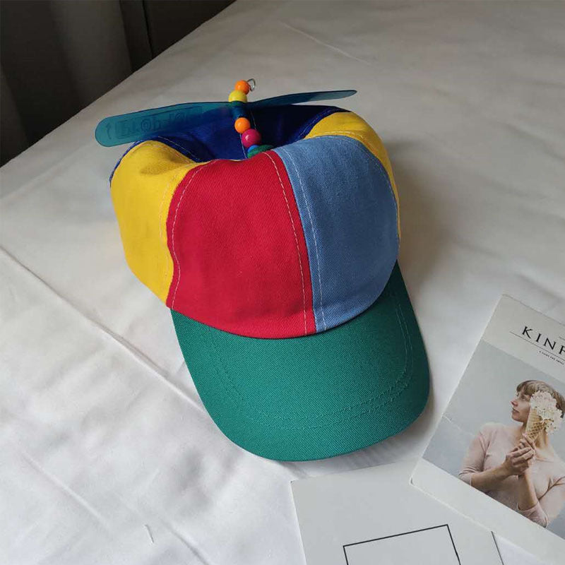 Propeller spinning bamboo dragonfly hat